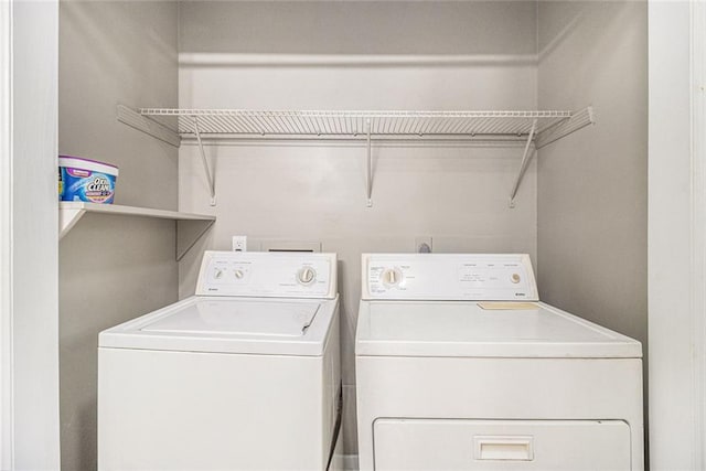 7002 Spout Springs Rd, Flowery Branch, GA 30542 - laundry room featuring separate washer and dryer