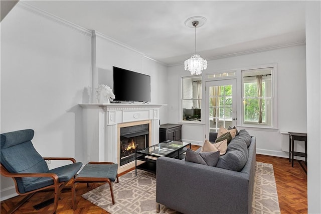 872 Briarcliff Rd NE Unit B2, Atlanta, GA 30306 - living room featuring ornamental molding, a warm lit fireplace, and a chandelier