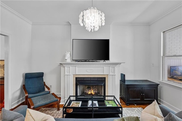 872 Briarcliff Rd NE Unit B2, Atlanta, GA 30306 - living room featuring a lit fireplace, crown molding, wood finished floors, and a chandelier