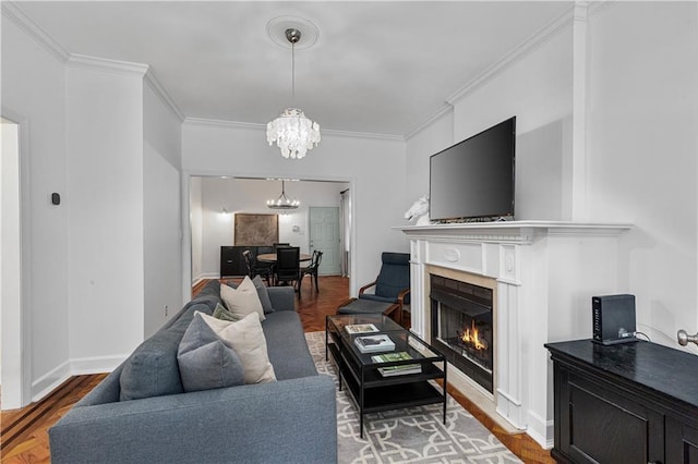 872 Briarcliff Rd NE Unit B2, Atlanta, GA 30306 - living area featuring a chandelier, crown molding, a lit fireplace, and wood finished floors