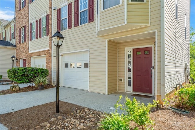 doorway to property featuring a garage