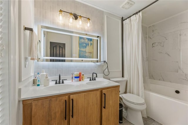 full bathroom with a sink, toilet, shower / bath combo with shower curtain, and double vanity