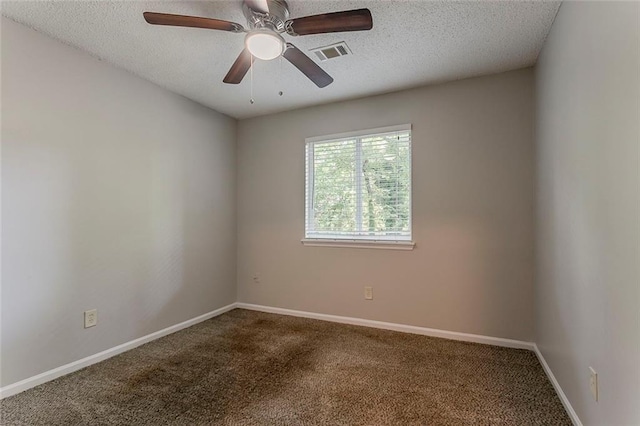 5383 Forest E Ln, Stone Mountain, GA 30088 - carpeted spare room featuring a textured ceiling and ceiling fan