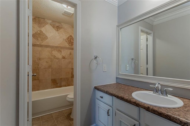 5383 Forest E Ln, Stone Mountain, GA 30088 - bathroom featuring vanity, crown molding, washtub / shower combination, and tile patterned flooring