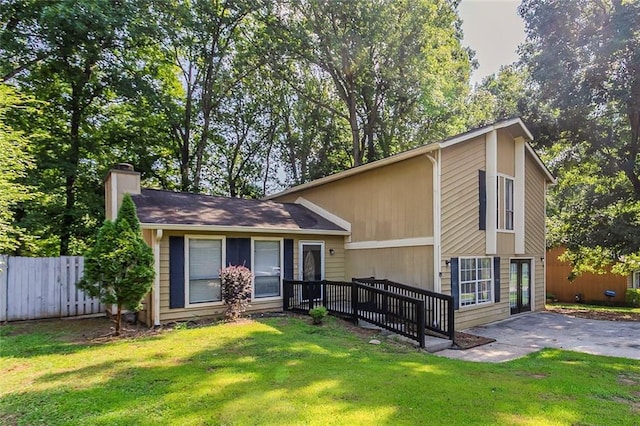 5383 Forest E Ln, Stone Mountain, GA 30088 - view of front facade featuring a chimney and a patio area