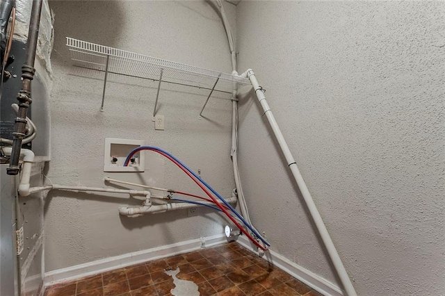 5383 Forest E Ln, Stone Mountain, GA 30088 - washroom with washer hookup and a textured wall