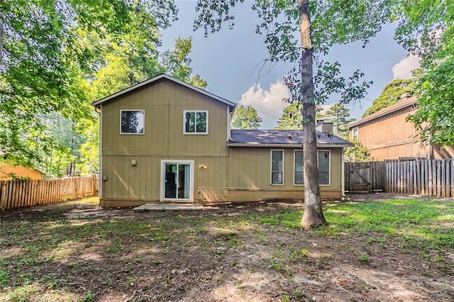 5383 Forest E Ln, Stone Mountain, GA 30088 - rear view of house featuring a fenced backyard