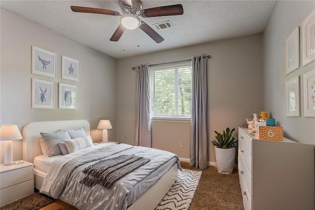 5383 Forest E Ln, Stone Mountain, GA 30088 - bedroom with carpet floors, a textured ceiling, and ceiling fan