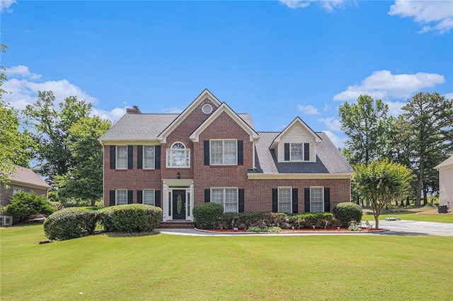 1644 Beaver Creek Ln, Snellville, GA 30078 - view of front of house with a front yard and brick siding