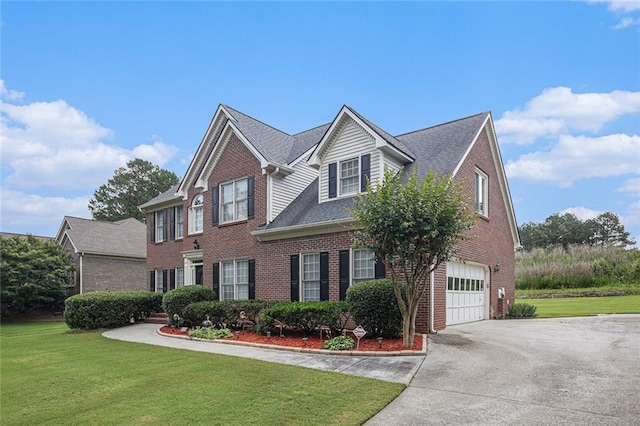 1644 Beaver Creek Ln, Snellville, GA 30078 - view of front of home featuring a garage, brick siding, concrete driveway, a front yard, and roof with shingles