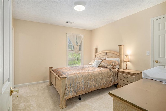 1644 Beaver Creek Ln, Snellville, GA 30078 - carpeted bedroom featuring a textured ceiling and baseboards