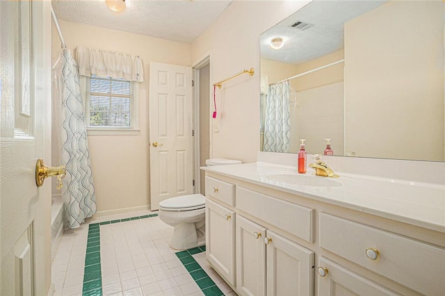 1644 Beaver Creek Ln, Snellville, GA 30078 - full bath featuring toilet, vanity, tile patterned floors, shower / bathtub combination with curtain, and a textured ceiling