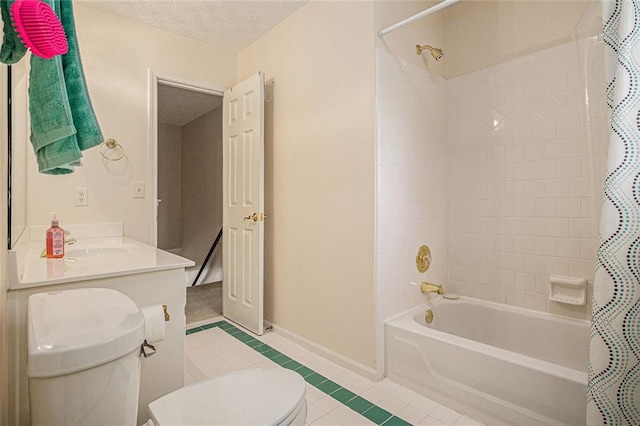 1644 Beaver Creek Ln, Snellville, GA 30078 - bathroom with toilet, tile patterned floors, shower / bath combination with curtain, baseboards, and a textured ceiling
