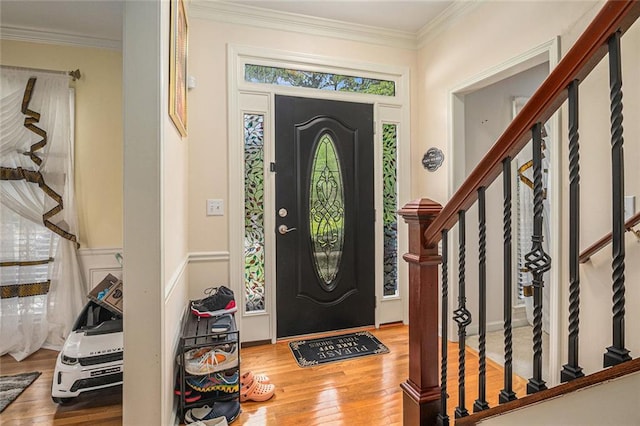 1644 Beaver Creek Ln, Snellville, GA 30078 - foyer with wood finished floors, stairway, and ornamental molding