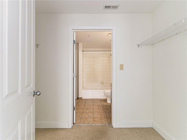 walk in closet featuring visible vents