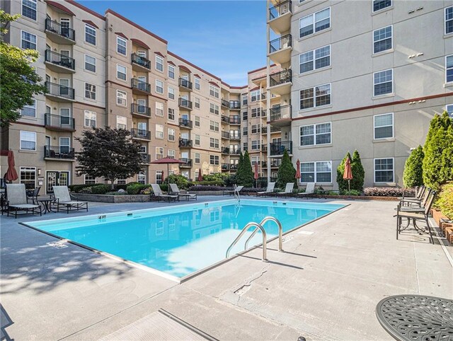 community pool featuring a patio