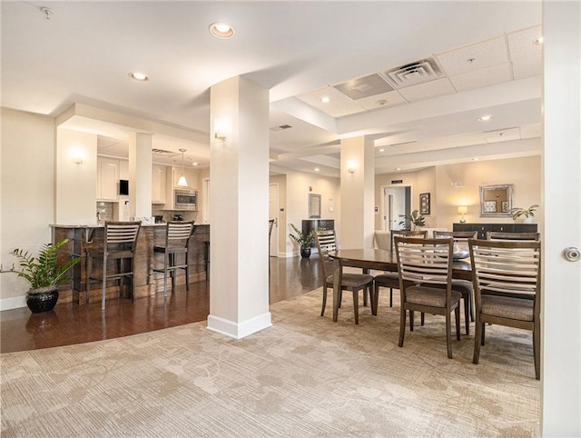 dining space featuring recessed lighting, baseboards, visible vents, and carpet floors