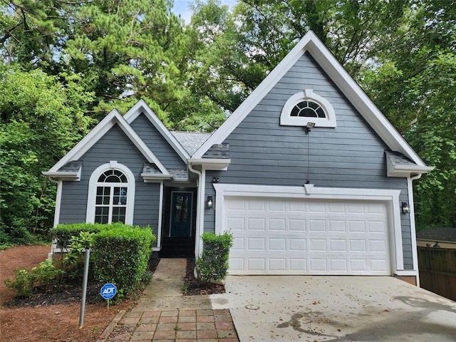 195 Burbank Dr NW, Atlanta, GA 30314 - view of front of house featuring concrete driveway and a garage