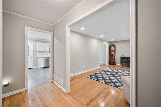 2941 Foothill Trl, Marietta, GA 30066 - entryway with light wood-style floors, ornamental molding, and recessed lighting