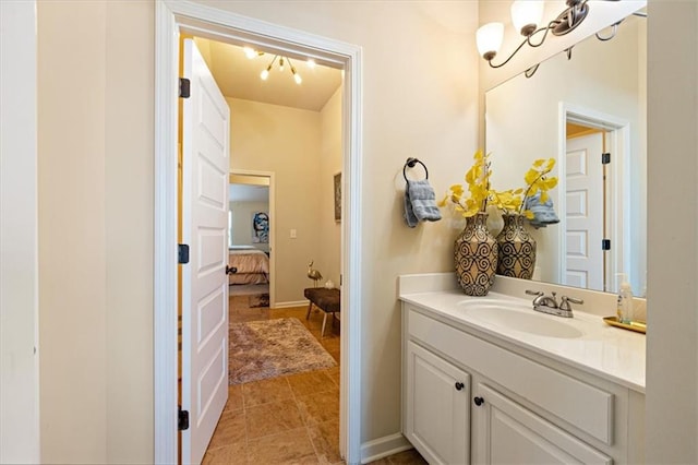 bathroom with tile patterned floors and vanity