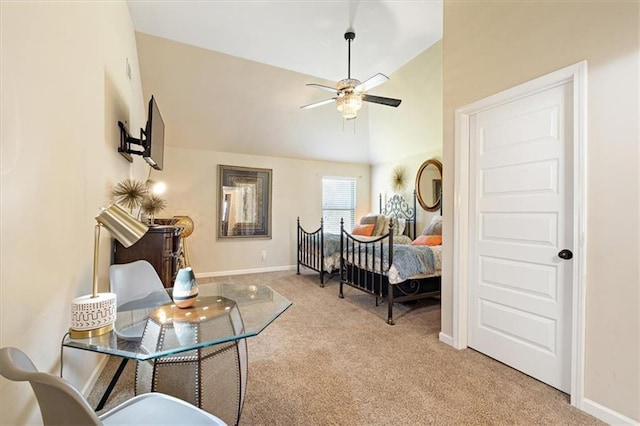 interior space with ceiling fan, lofted ceiling, and carpet