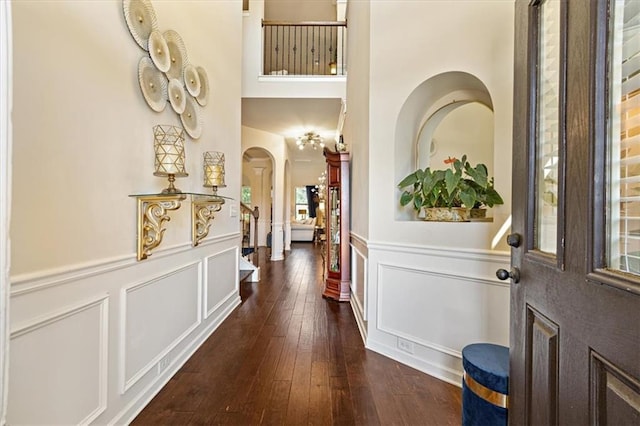 entryway with dark hardwood / wood-style floors