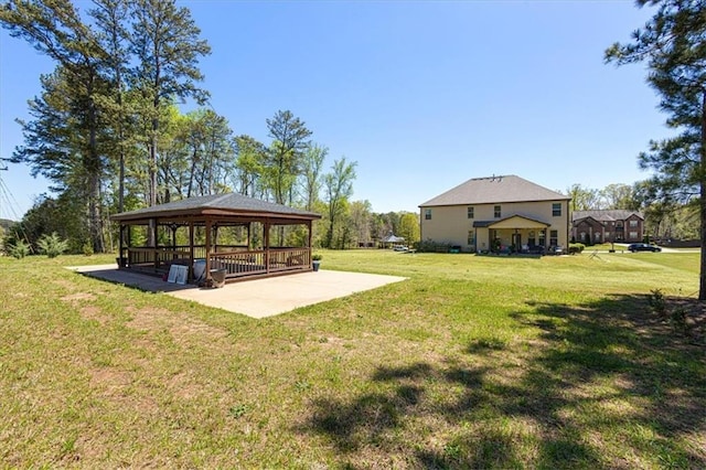 view of yard with a gazebo and a patio area