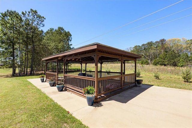 view of home's community with a gazebo and a yard