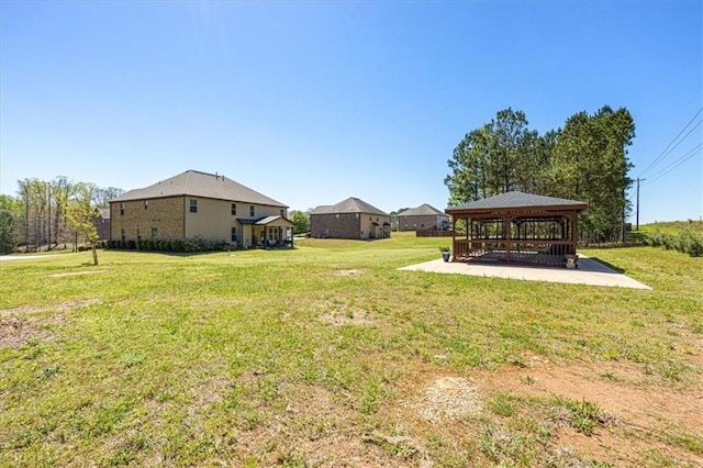 view of yard with a patio and a gazebo