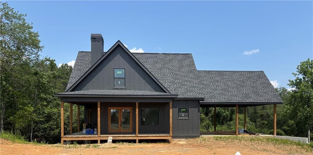 269 Old Orchard Rd, Ellijay, GA 30536 - rear view of property with french doors, a chimney, board and batten siding, and roof with shingles
