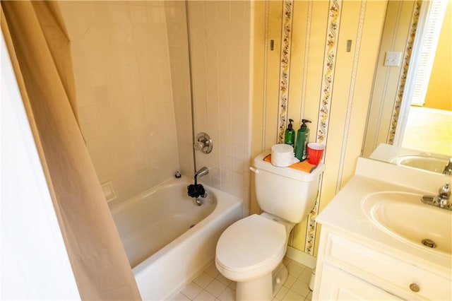 full bath with tile patterned flooring, vanity, toilet, and shower / bathtub combination