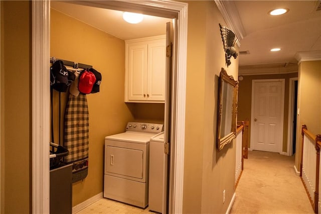 laundry area featuring washer and clothes dryer, recessed lighting, cabinet space, ornamental molding, and baseboards