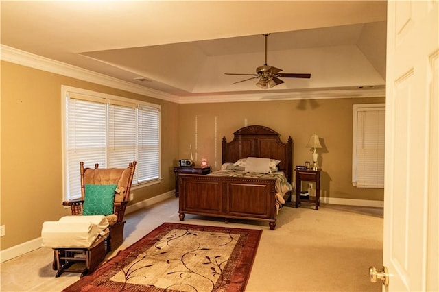 bedroom with baseboards, light colored carpet, and crown molding