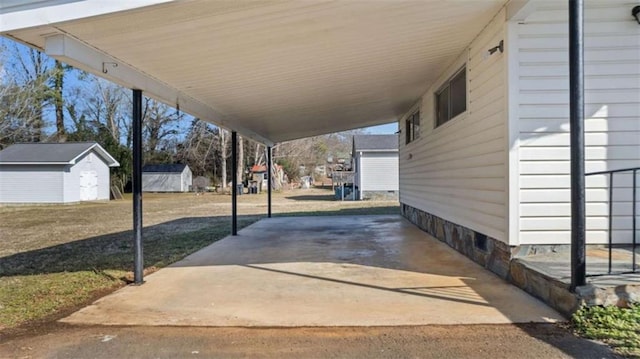 view of patio / terrace with a shed