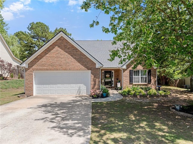 1338 Jefferson Station Rd, Jefferson, GA 30549 - ranch-style house featuring fence, an attached garage, a shingled roof, brick siding, and concrete driveway
