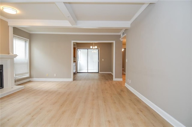 unfurnished living room with beam ceiling, a fireplace with raised hearth, light wood-style flooring, and baseboards