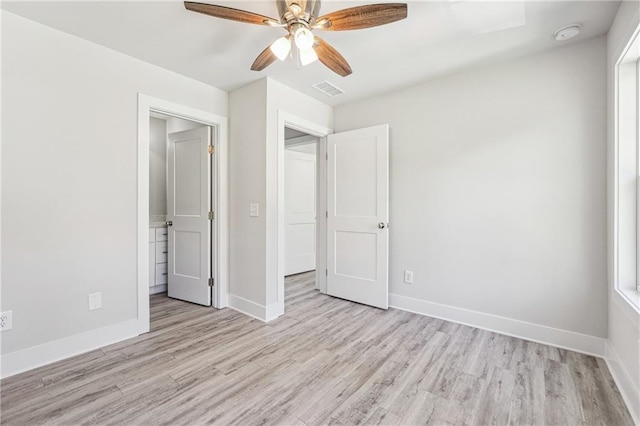 6075 Quail Mountain Trl, Gainesville, GA 30506 - unfurnished bedroom with light wood-style floors, baseboards, and a ceiling fan