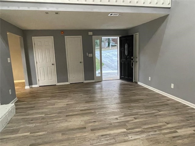 foyer entrance featuring hardwood / wood-style flooring