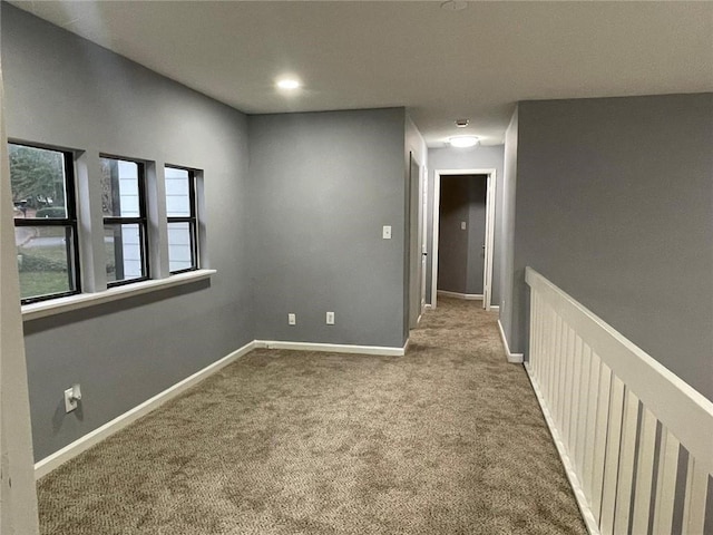 unfurnished room with carpet