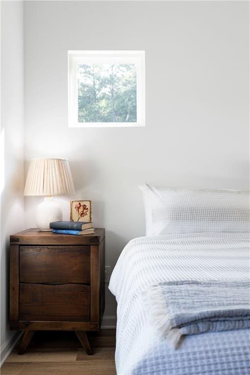 bedroom featuring wood-type flooring