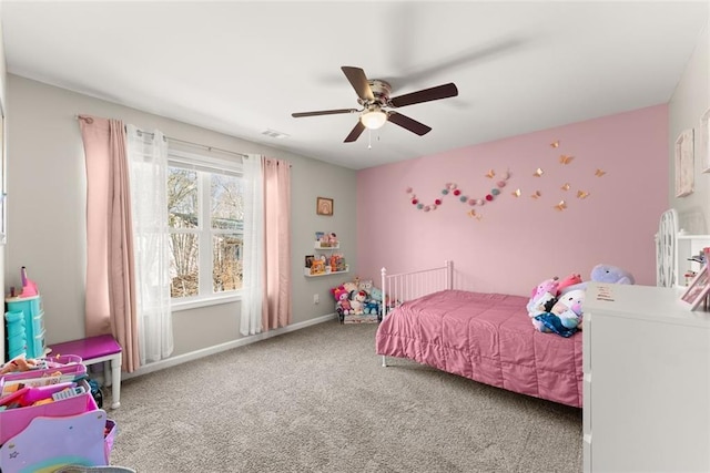 bedroom with carpet floors, ceiling fan, visible vents, and baseboards