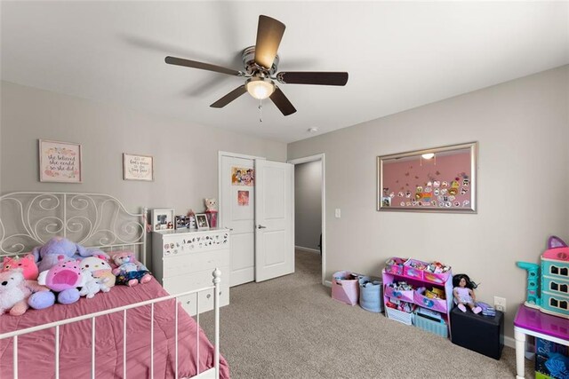 carpeted bedroom with ceiling fan