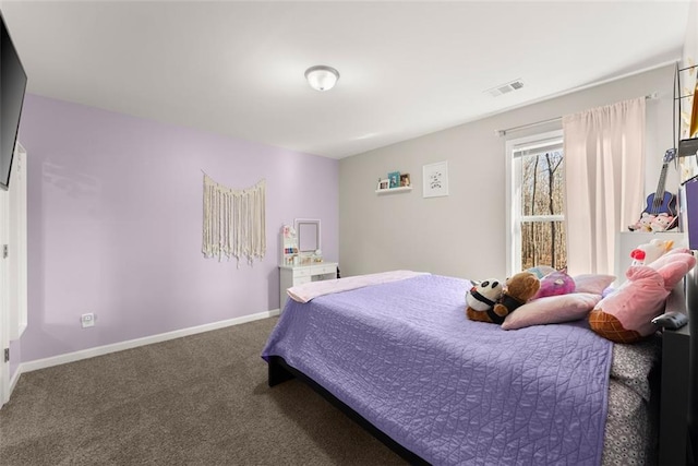 carpeted bedroom with baseboards and visible vents