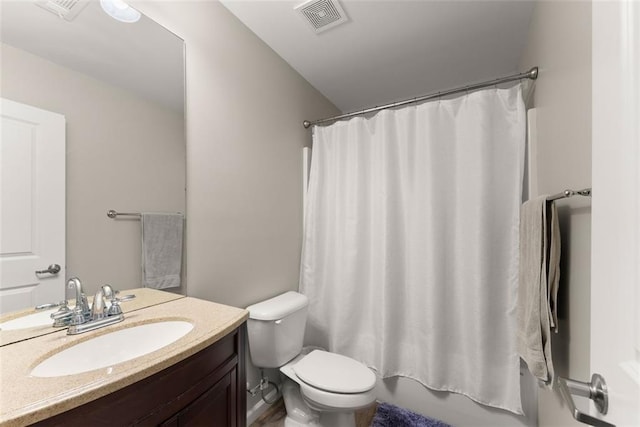 full bath with toilet, visible vents, and vanity