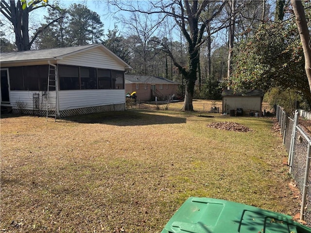 view of yard with a sunroom