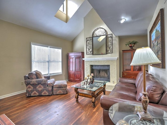 living room featuring a fireplace, wood-type flooring, and vaulted ceiling