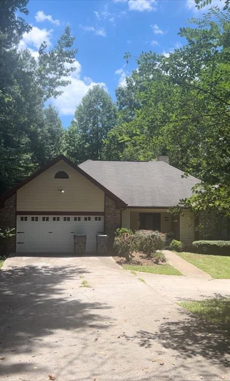 ranch-style home with a garage