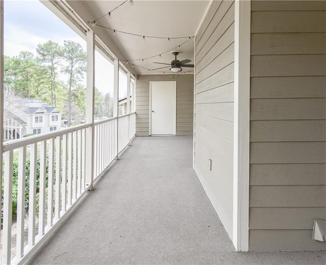 exterior space with a ceiling fan