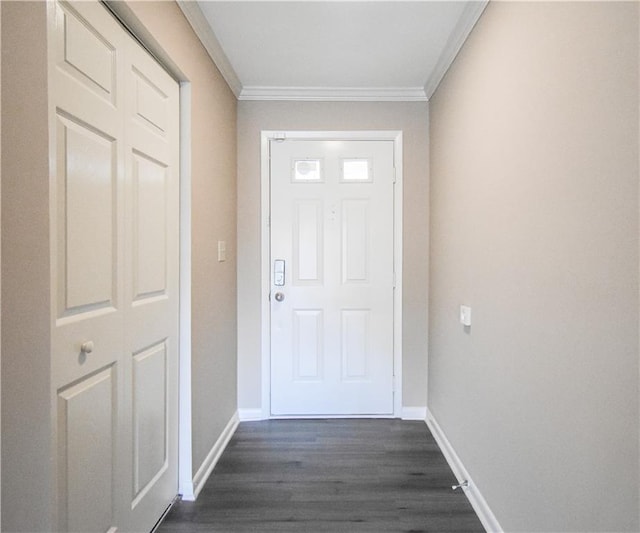 doorway to outside with dark wood-style floors, crown molding, and baseboards
