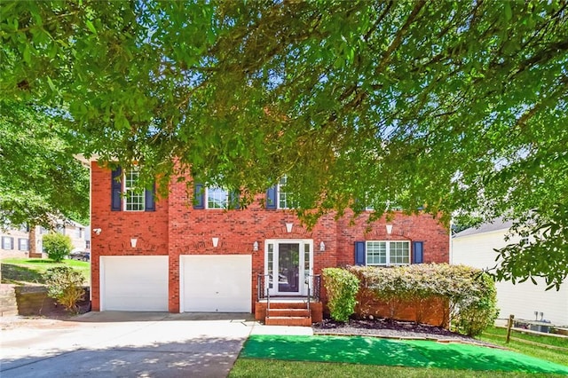 5900 Fairington Farms Ln, Stonecrest, GA 30038 - view of front of property featuring driveway, an attached garage, and brick siding